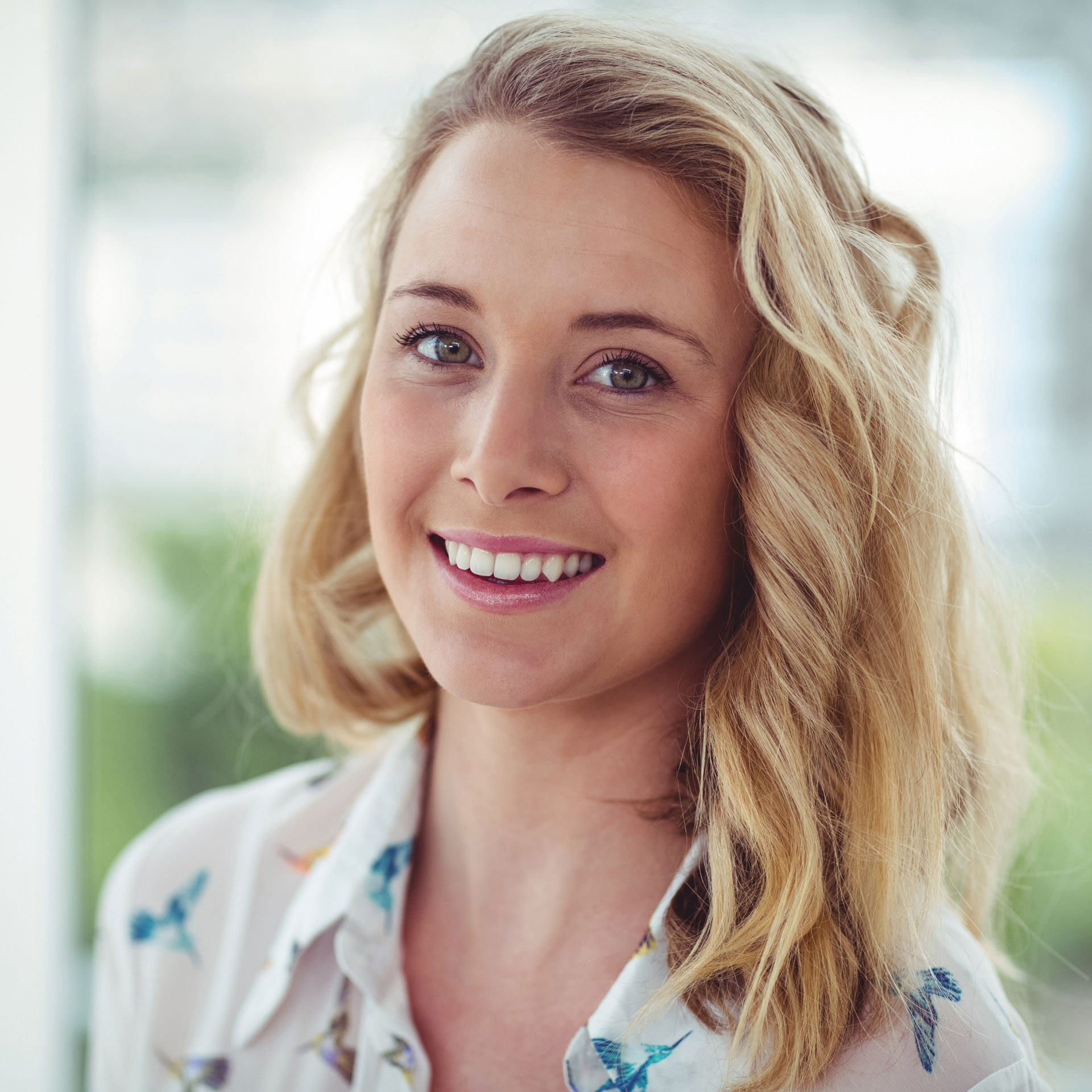 young woman smiling at camera